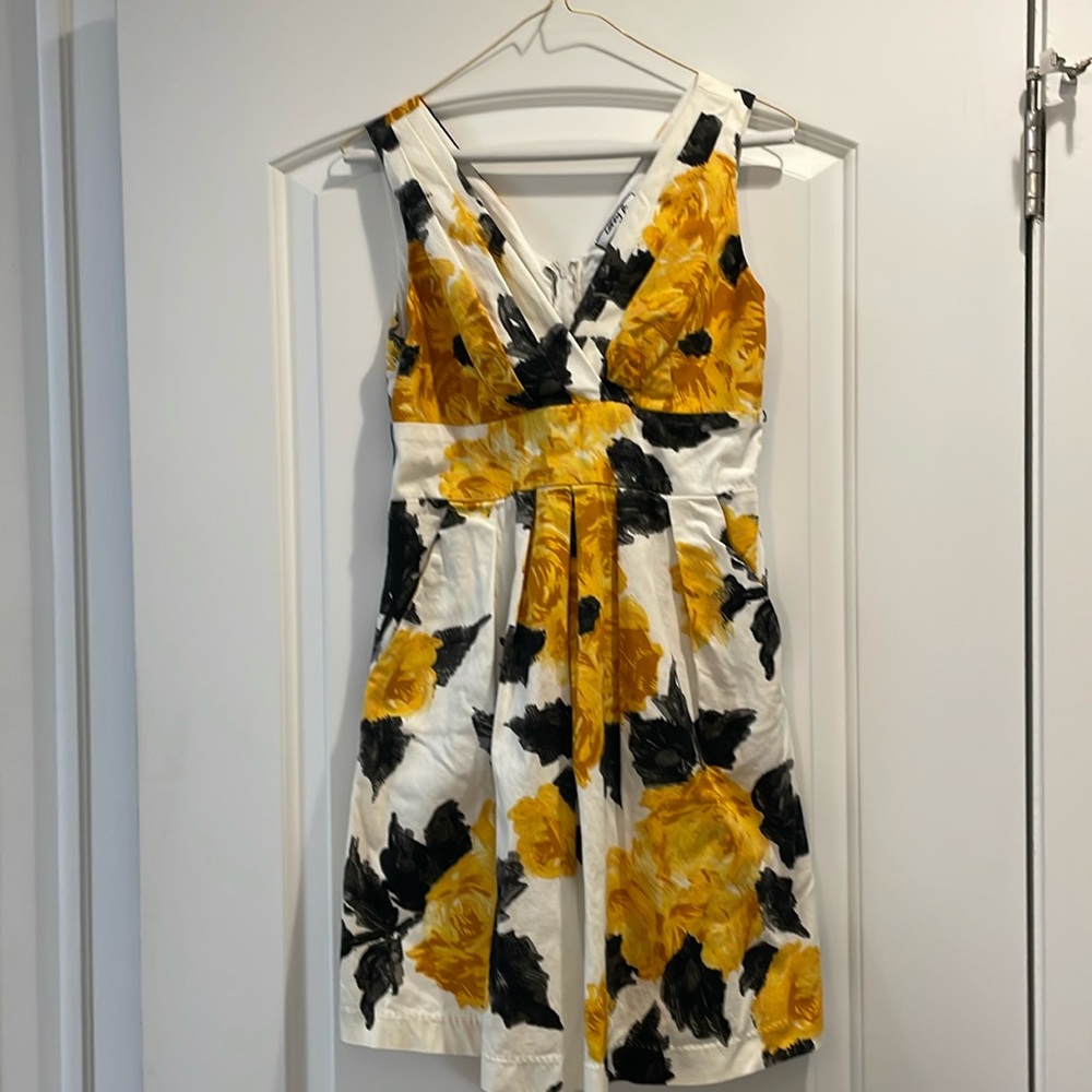 Black and yellow tea length dress. Size 8, Corey P.